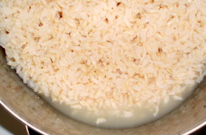 Water in almost-cooked rice