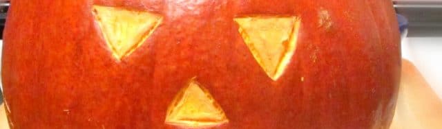 Make a Jack o'Lantern Roast Sutuffed Pumpkin, for a perfect festive Halloween dinner!