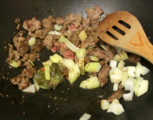 Saute meat, peppers and onion - wwww.inhabitedkitchen.com