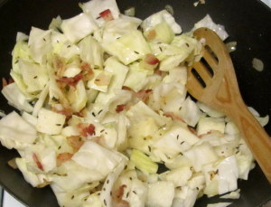 Sauteing cabbage, with bacon, onion, garlic and caraway seed - www.inhabitedkitchen.com