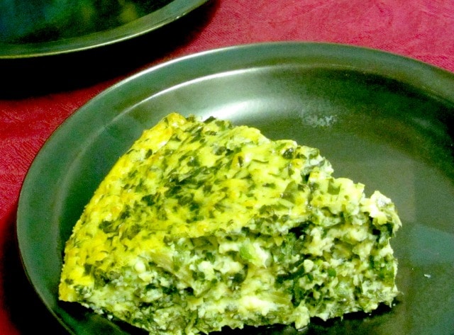 Use cooked chard - or other greens - to make a chard crustless quiche. Serve hot or cold, lunch or dinner! www.inhabitedkitchen.com