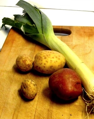 Take an assortment of aromatic vegetables, add potatoes and broth, and make a hearty vegetable soup! 