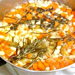 Not Cassoulet - but closely related. White beans with cured meat and root vegetables melted into them for flavor and richness, perfect on a cold, snowy day.