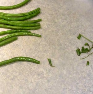 Trim fresh green beans.