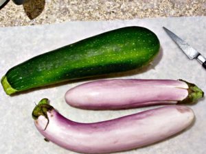 Zucchini and eggplant on a cutting board